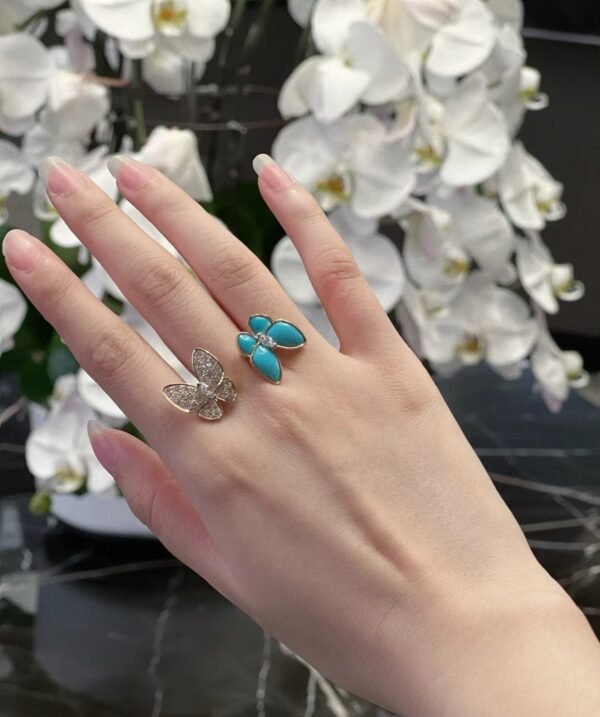 Van Cleef & Arpels. Two Butterfly Between the Finger ring