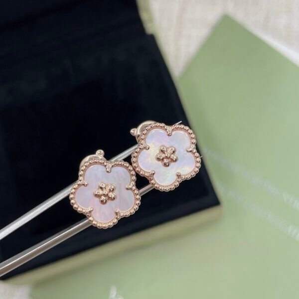 Van Cleef & Arpels. Lucky Spring earrings, plum blossom