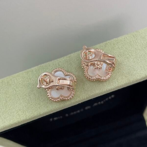 Van Cleef & Arpels. Lucky Spring earrings, plum blossom