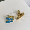 Van Cleef & Arpels. Two Butterfly earrings