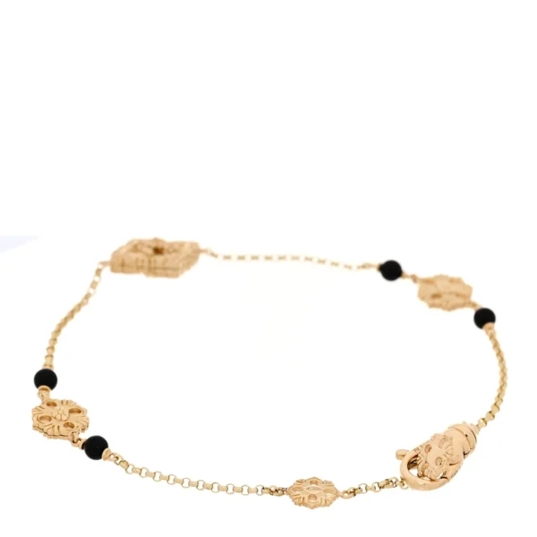 BUCCELLATI. OPERA TULLE YELLOW GOLD BRACELET WITH ONYX LOGO
