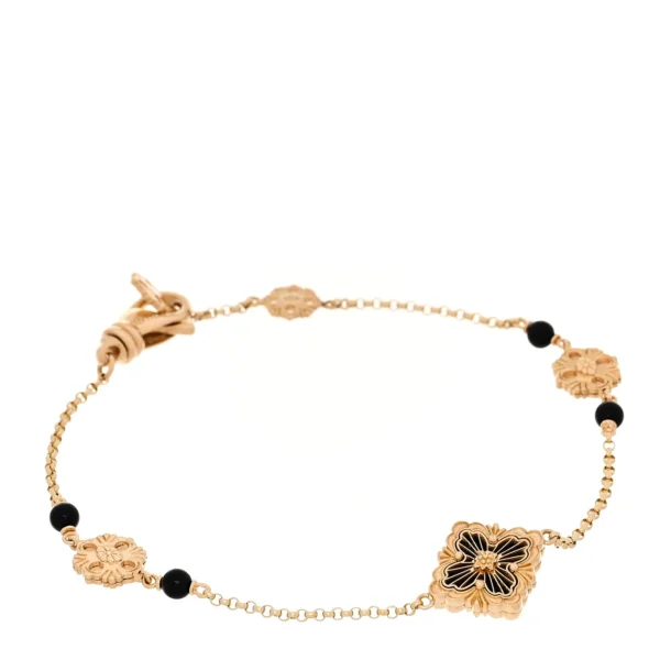 BUCCELLATI. OPERA TULLE YELLOW GOLD BRACELET WITH ONYX LOGO