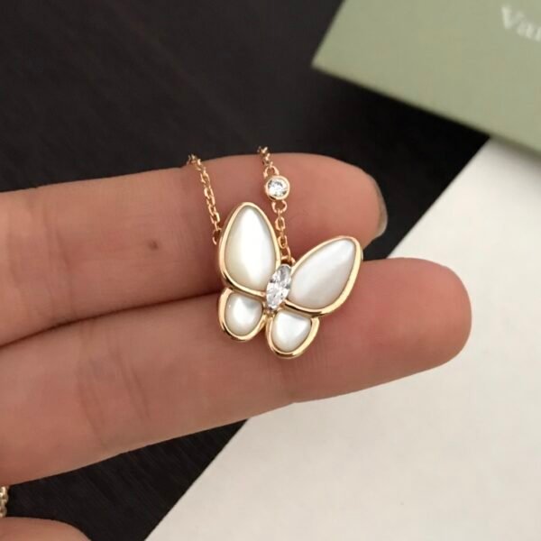 Van Cleef & Arpels. Two Butterfly pendant
