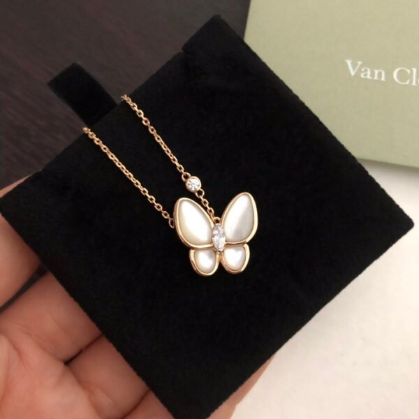 Van Cleef & Arpels. Two Butterfly pendant