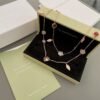 Van Cleef & Arpels. Lucky Spring long necklace, 15 motifs