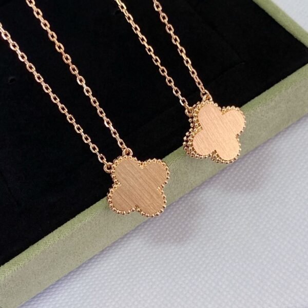 Van Cleef & Arpels. Vintage Alhambra Diamond Two Tone Holiday Pendant 2021