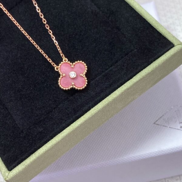 Van Cleef & Arpels. Vintage Alhambra Diamond Two Tone Holiday Pendant 2021