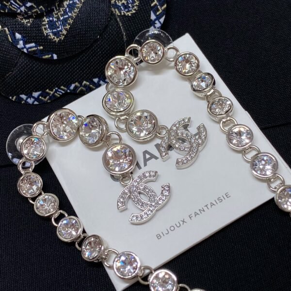 CHANEL. Crystal Long Tassel Earrings