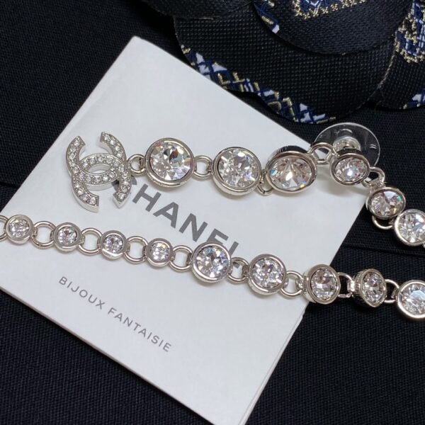 CHANEL. Crystal Long Tassel Earrings