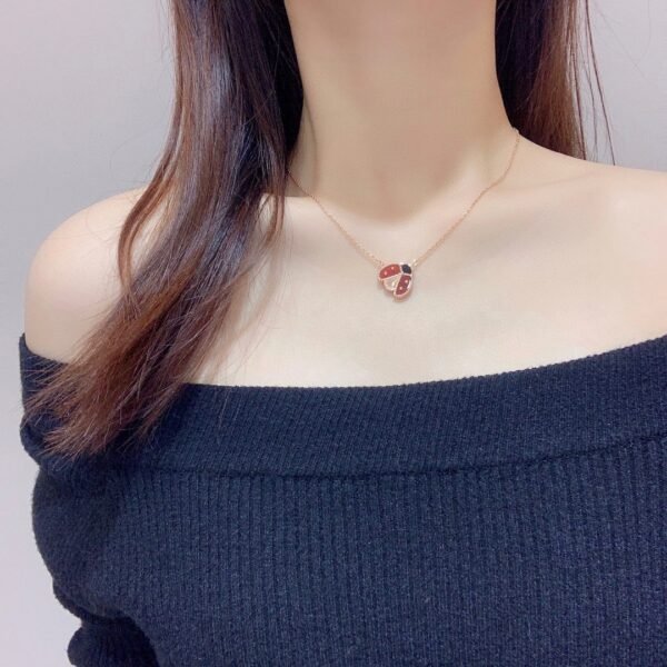 Van Cleef & Arpels. Lucky Spring pendant, open wings ladybug