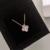 Van Cleef & Arpels. Vintage Alhambra Diamond Two Tone Holiday Pendant 2023