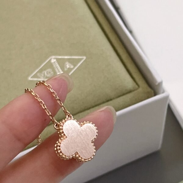 Van Cleef & Arpels. Vintage Alhambra Diamond Two Tone Holiday Pendant 2023