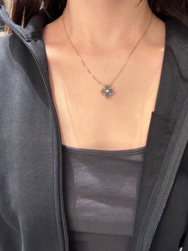 Van Cleef & Arpels. Vintage Alhambra Diamond Two Tone Holiday Pendant 2023