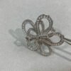Van Cleef & Arpels. Flowerlace clip and pendant