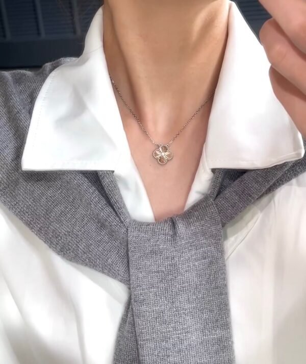 Van Cleef & Arpels. Vintage Alhambra Diamond Two Tone Holiday Pendant 2024