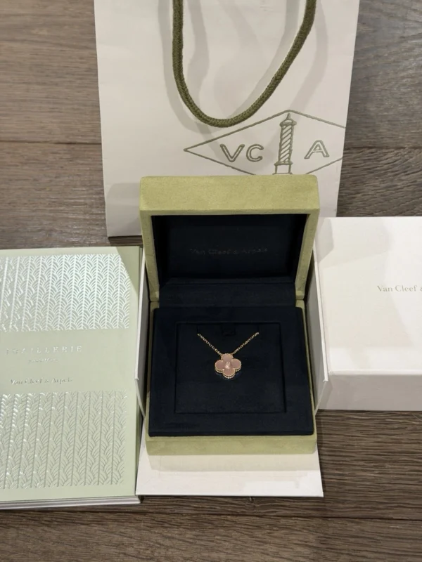 Van Cleef & Arpels. Vintage Alhambra Diamond Two Tone Holiday Pendant 2025