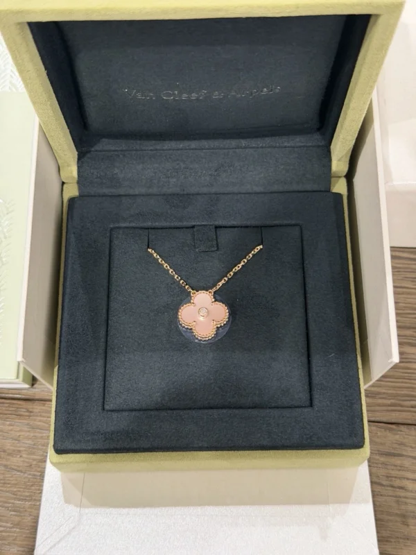 Van Cleef & Arpels. Vintage Alhambra Diamond Two Tone Holiday Pendant 2025