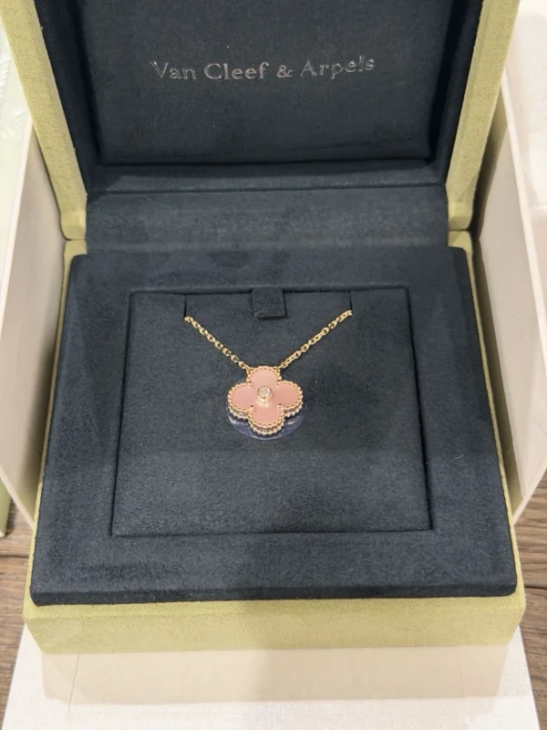 Van Cleef & Arpels. Vintage Alhambra Diamond Two Tone Holiday Pendant 2025