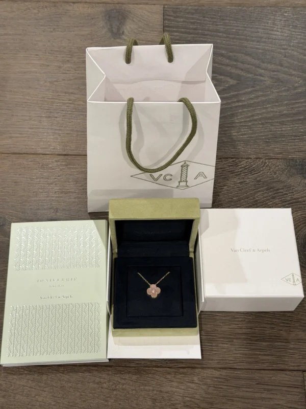 Van Cleef & Arpels. Vintage Alhambra Diamond Two Tone Holiday Pendant 2025