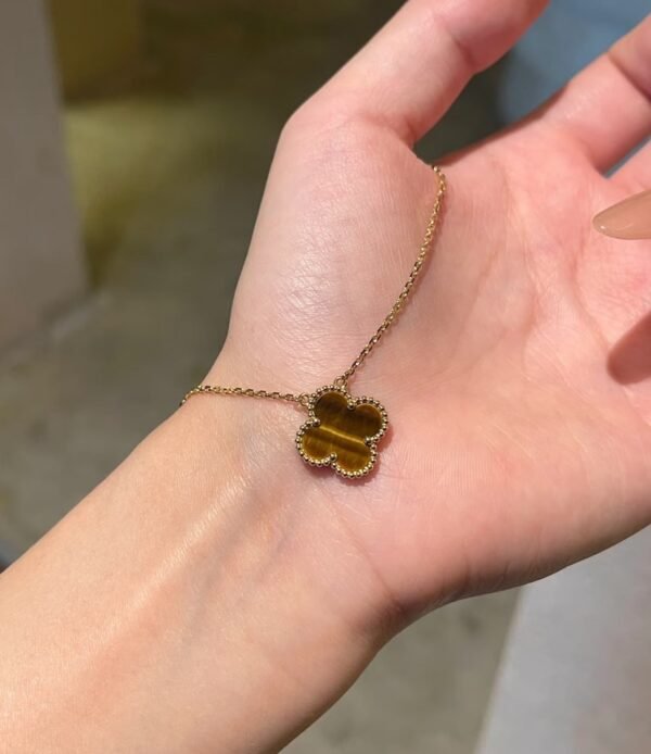 Van Cleef & Arpels. Vintage Alhambra pendant (Tiger Eye)