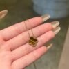 Van Cleef & Arpels. Vintage Alhambra pendant (Tiger Eye)