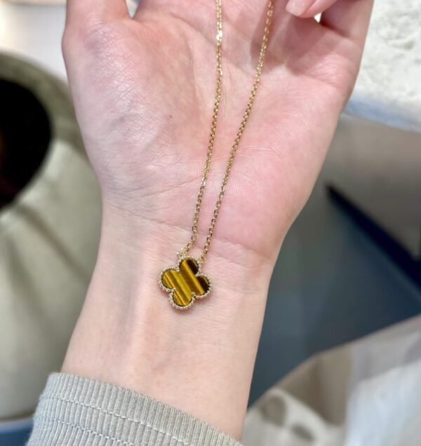 Van Cleef & Arpels. Vintage Alhambra pendant (Tiger Eye)