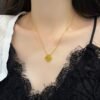 Van Cleef & Arpels. Vintage Alhambra pendant (Tiger Eye)