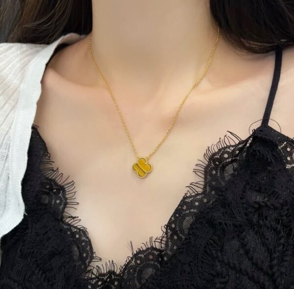 Van Cleef & Arpels. Vintage Alhambra pendant (Tiger Eye)