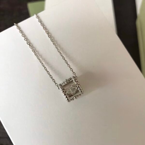 Van Cleef & Arpels. Perlée clovers pendant (White Gold)