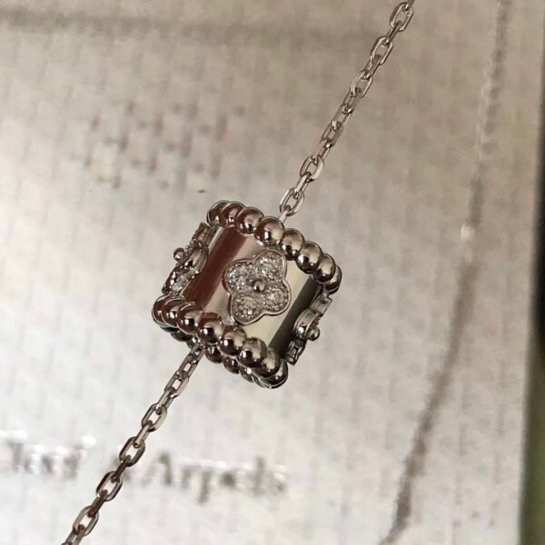 Van Cleef & Arpels. Perlée clovers pendant (White Gold)