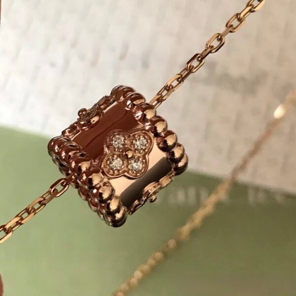 Van Cleef & Arpels. Perlée clovers pendant (Rose Gold)