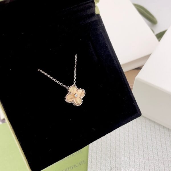 Van Cleef & Arpels. Vintage Alhambra Diamond Two Tone Holiday Pendant 2024