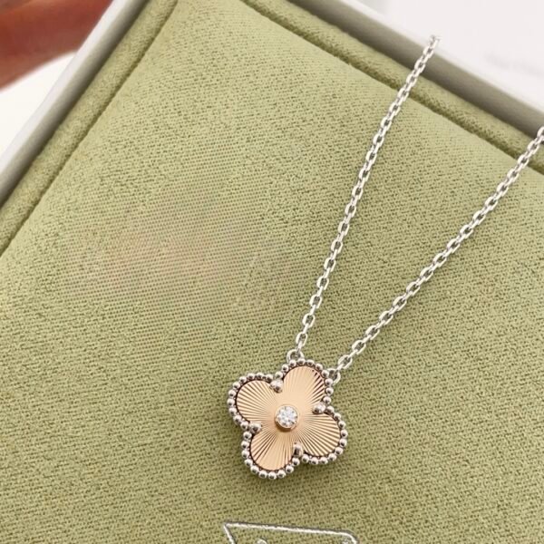 Van Cleef & Arpels. Vintage Alhambra Diamond Two Tone Holiday Pendant 2024