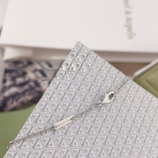 Van Cleef & Arpels. Vintage Alhambra Diamond Two Tone Holiday Pendant 2024