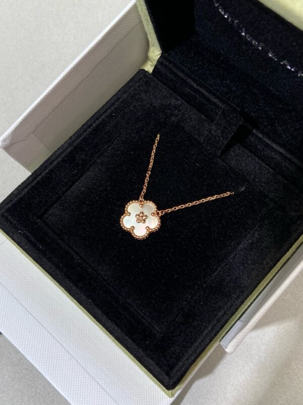 Van Cleef & Arpels. Lucky Spring pendant, plum blossom