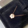 Van Cleef & Arpels. Lucky Spring pendant, plum blossom