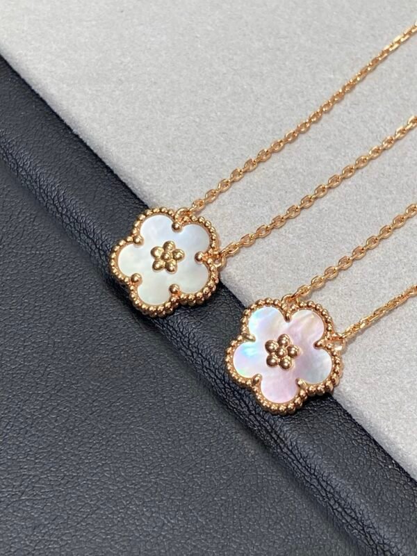 Van Cleef & Arpels. Lucky Spring pendant, plum blossom
