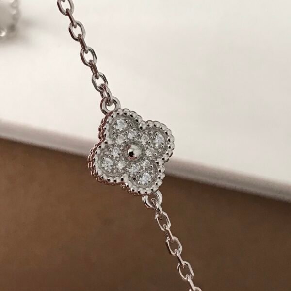 Van Cleef & Arpels. Sweet Alhambra bracelet, 6 motifs 18K white gold, Diamond