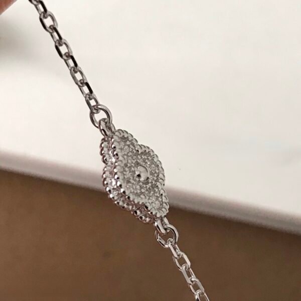 Van Cleef & Arpels. Sweet Alhambra bracelet, 6 motifs 18K white gold, Diamond