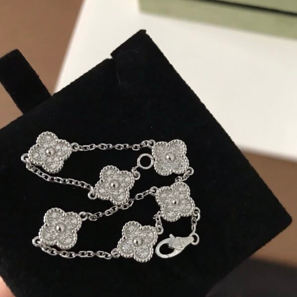 Van Cleef & Arpels. Sweet Alhambra bracelet, 6 motifs 18K white gold, Diamond