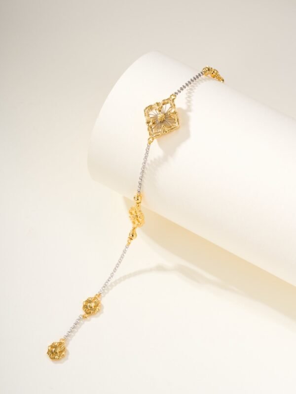 BUCCELLATI. OPERA TULLE YELLOW AND WHITE GOLD RAGGIERA BRACELET