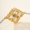 BUCCELLATI. OPERA TULLE YELLOW AND WHITE GOLD RAGGIERA BRACELET