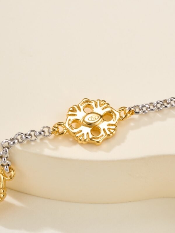 BUCCELLATI. OPERA TULLE YELLOW AND WHITE GOLD RAGGIERA BRACELET