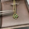 BUCCELLATI. OPERA TULLE PENDANT IN YELLOW GOLD WITH GREEN ENAMEL