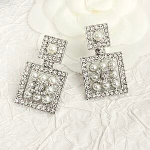 CHANEL. Pavé Diamond & Pearl Perfume Bottle Stud Earrings