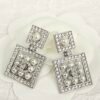 CHANEL. Pavé Diamond & Pearl Perfume Bottle Stud Earrings